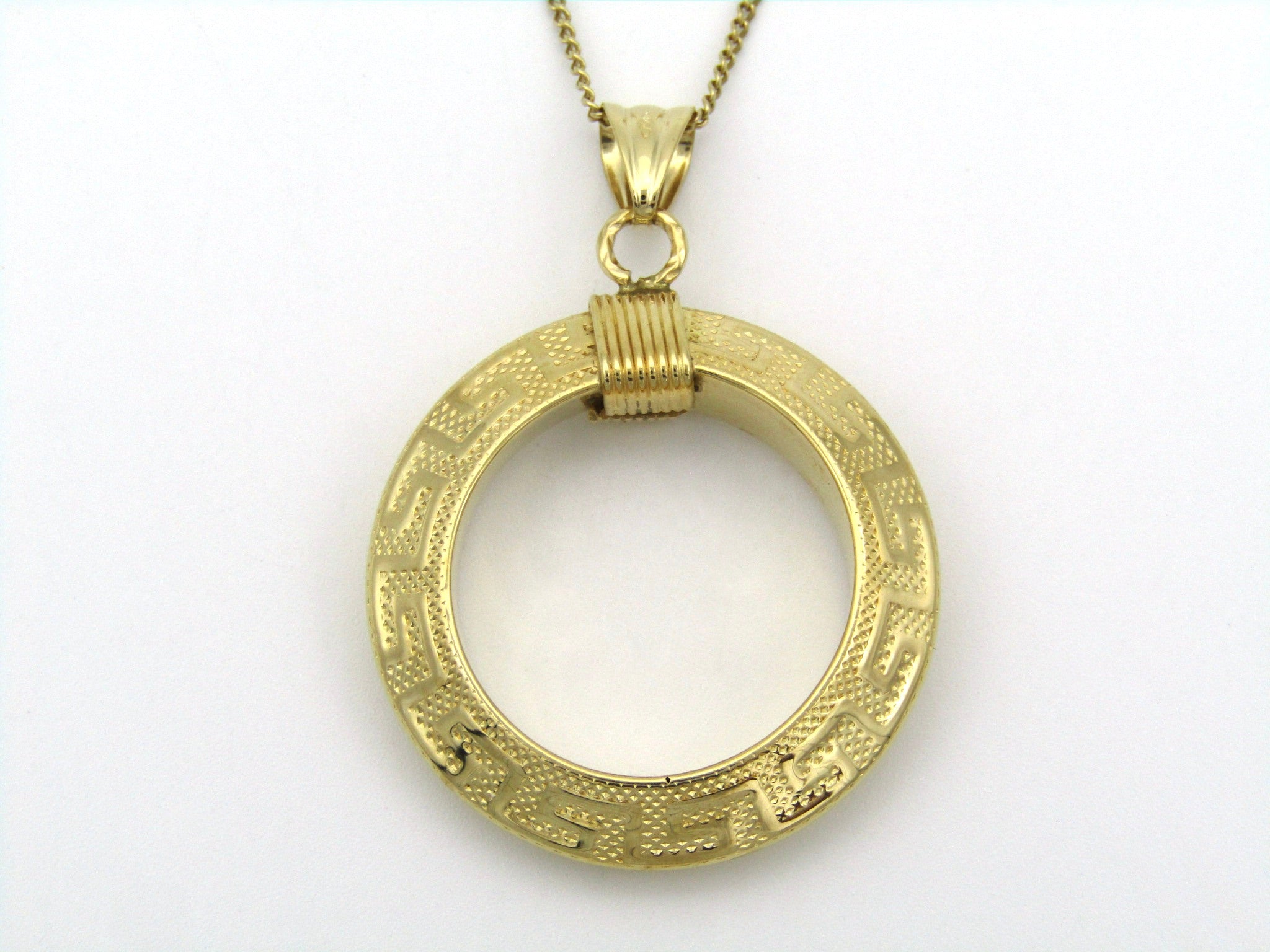 18K gold Versace style Greek key pattern pendant.