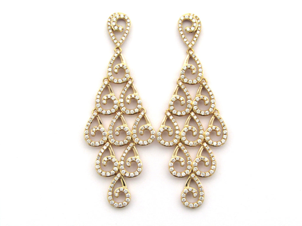18K gold diamond dangle earrings.