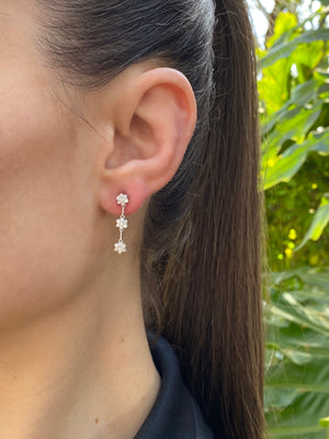 18K gold diamond drop flower earrings by Browns.