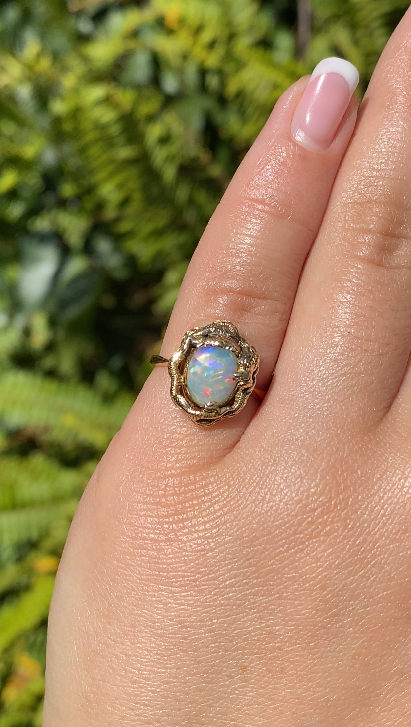 9K gold opal and Chinese Dragon ring.