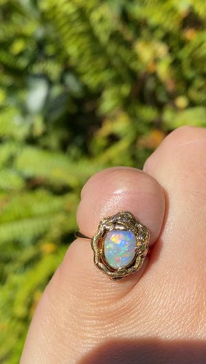 9K gold opal and Chinese Dragon ring.