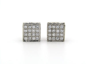18K gold black and colourless diamond earrings.