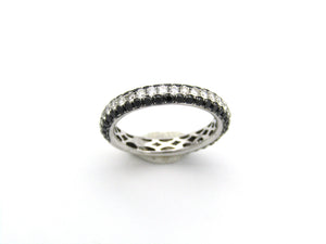 18K gold black and colourless diamond ring.