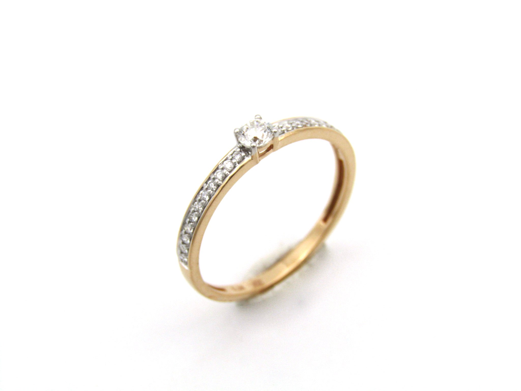 18K gold diamond ring.
