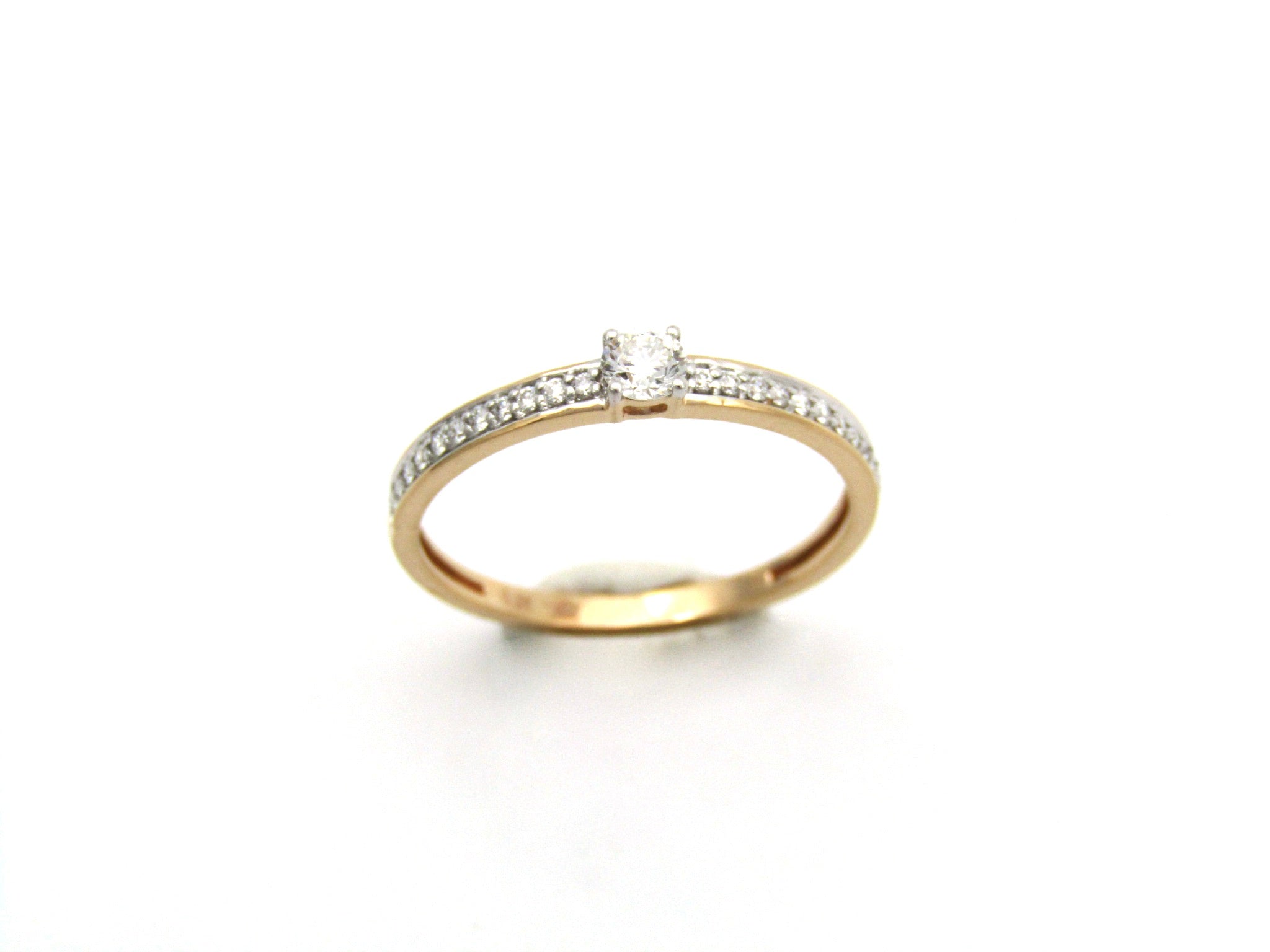 18K gold diamond ring.