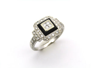18K gold diamond and enamel ring by Browns.