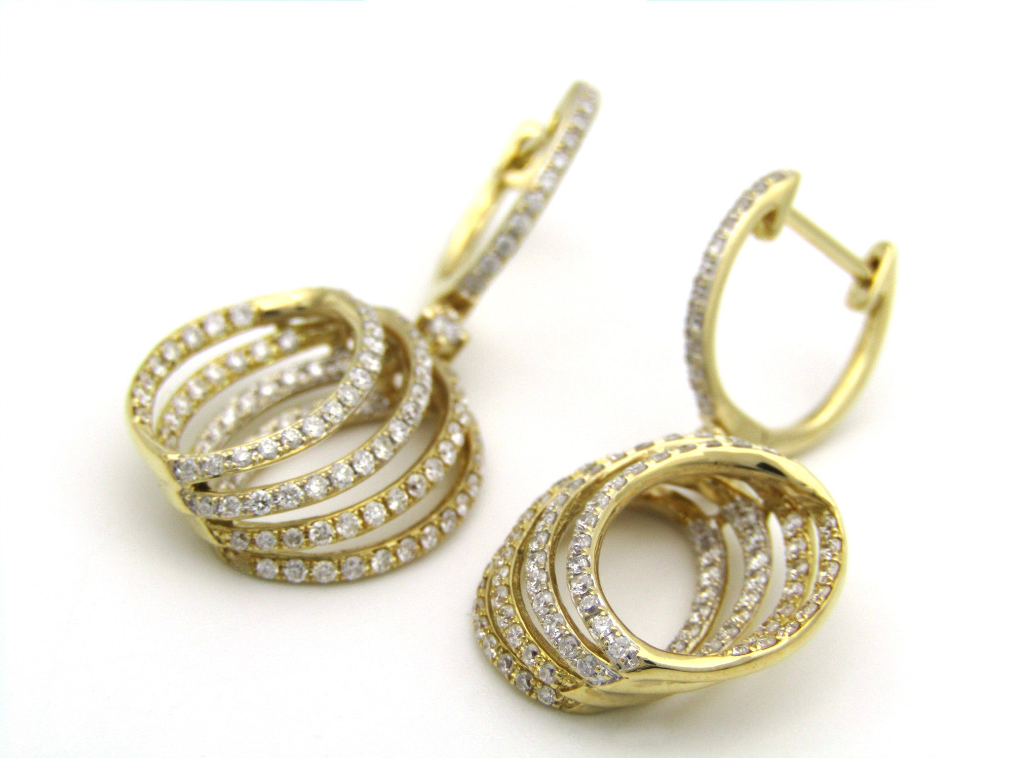18K gold diamond drop earrings.