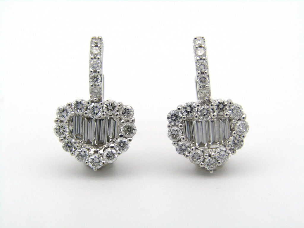 18K gold diamond heart earrings.