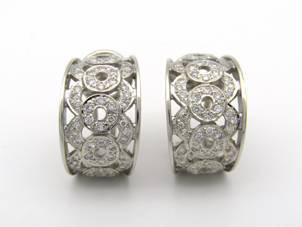 18K gold diamond earrings by Chimento.