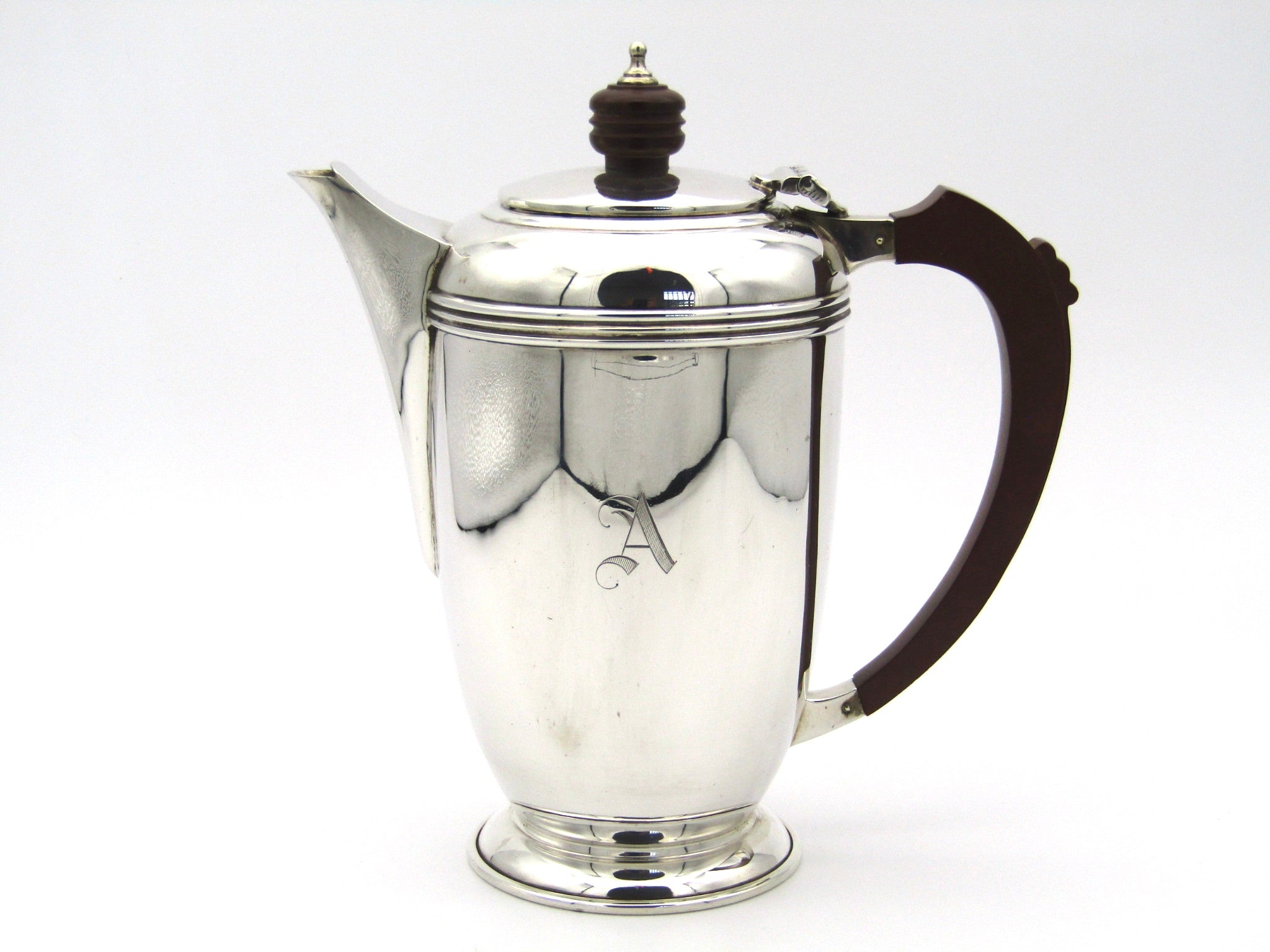 A four piece silver Bachelor tea set by Deacon & Francis, Birmingham, 1958.