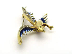 18kt gold diamond and enamel "Bird in flight" brooch.