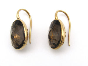 18kt gold smokey quartz earrings by designer Pomellato.