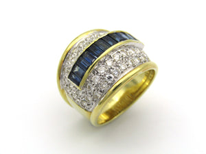 18K gold sapphire and diamond dress ring.