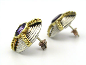 A pair of 18kt and 9kt gold amethyst earrings.