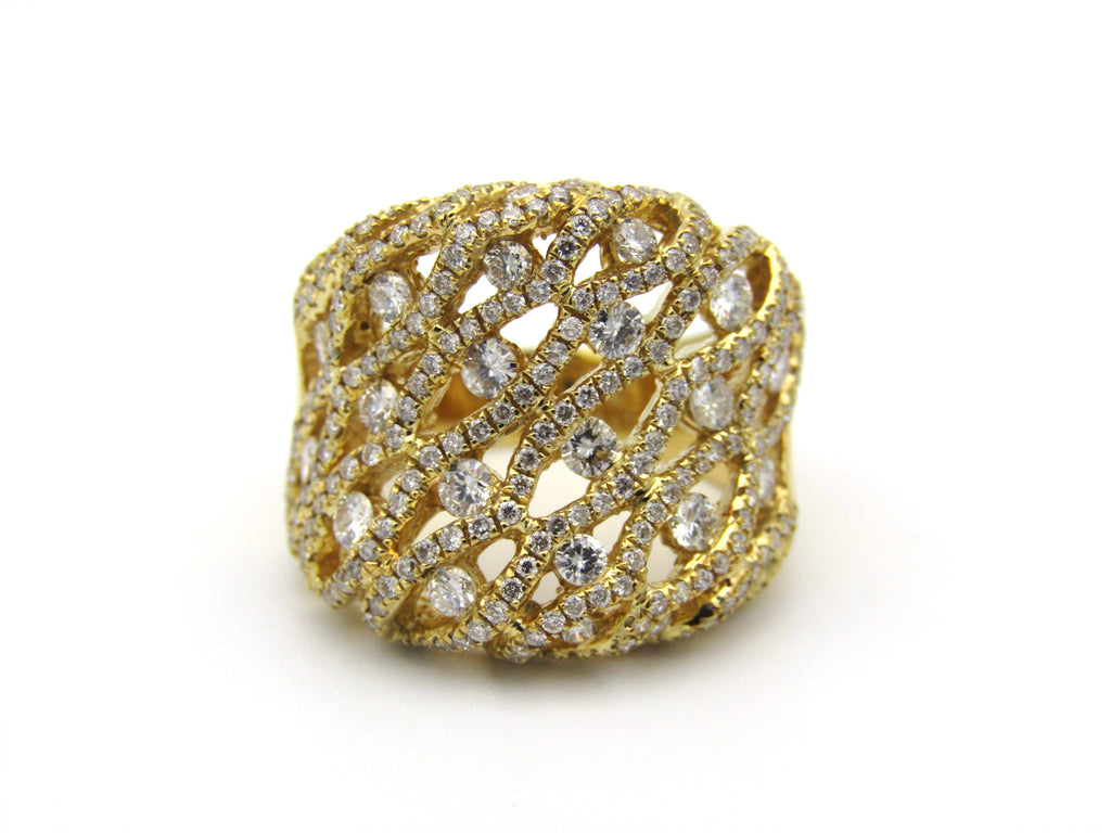 18K gold diamond dress ring.