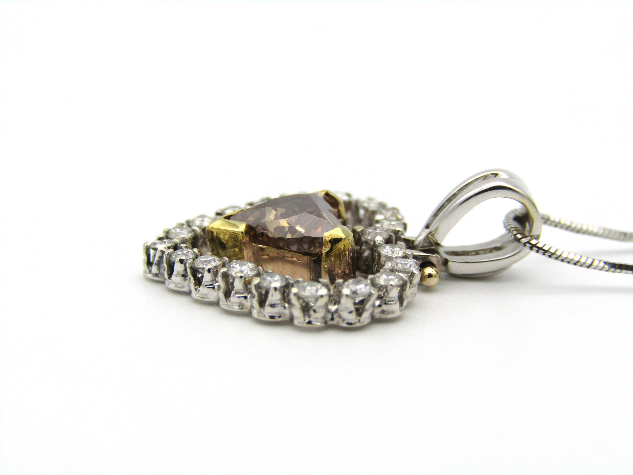 18kt gold cognac diamond pendant.