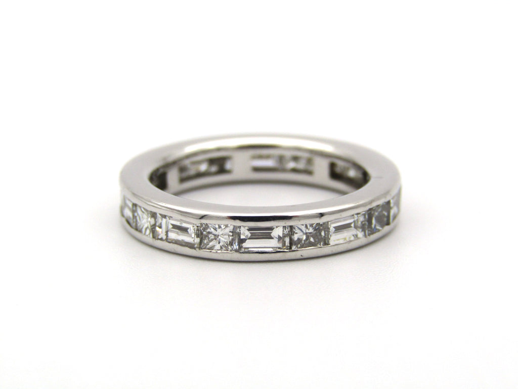 18K gold diamond eternity ring.