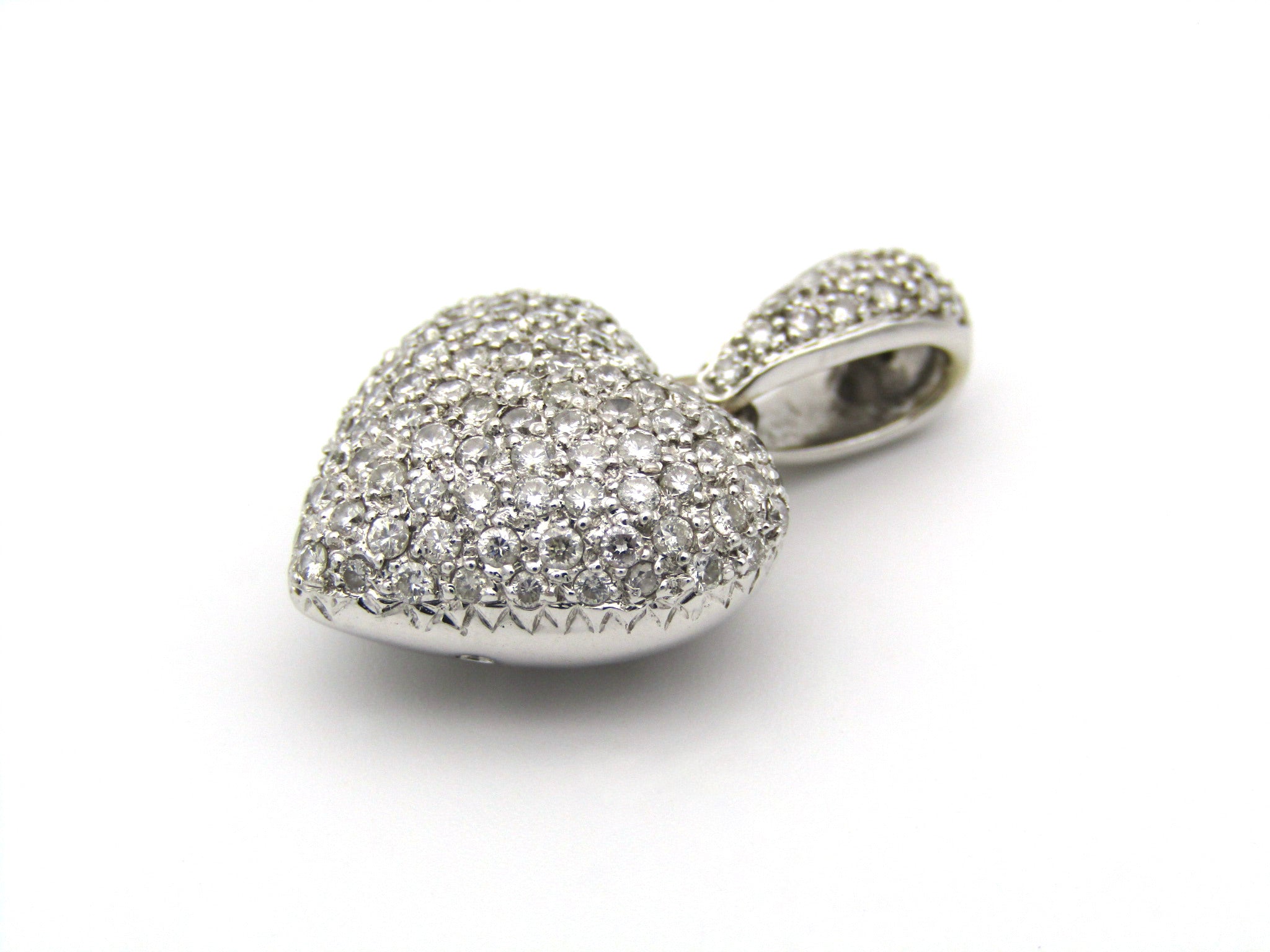 18K gold diamond heart pendant.