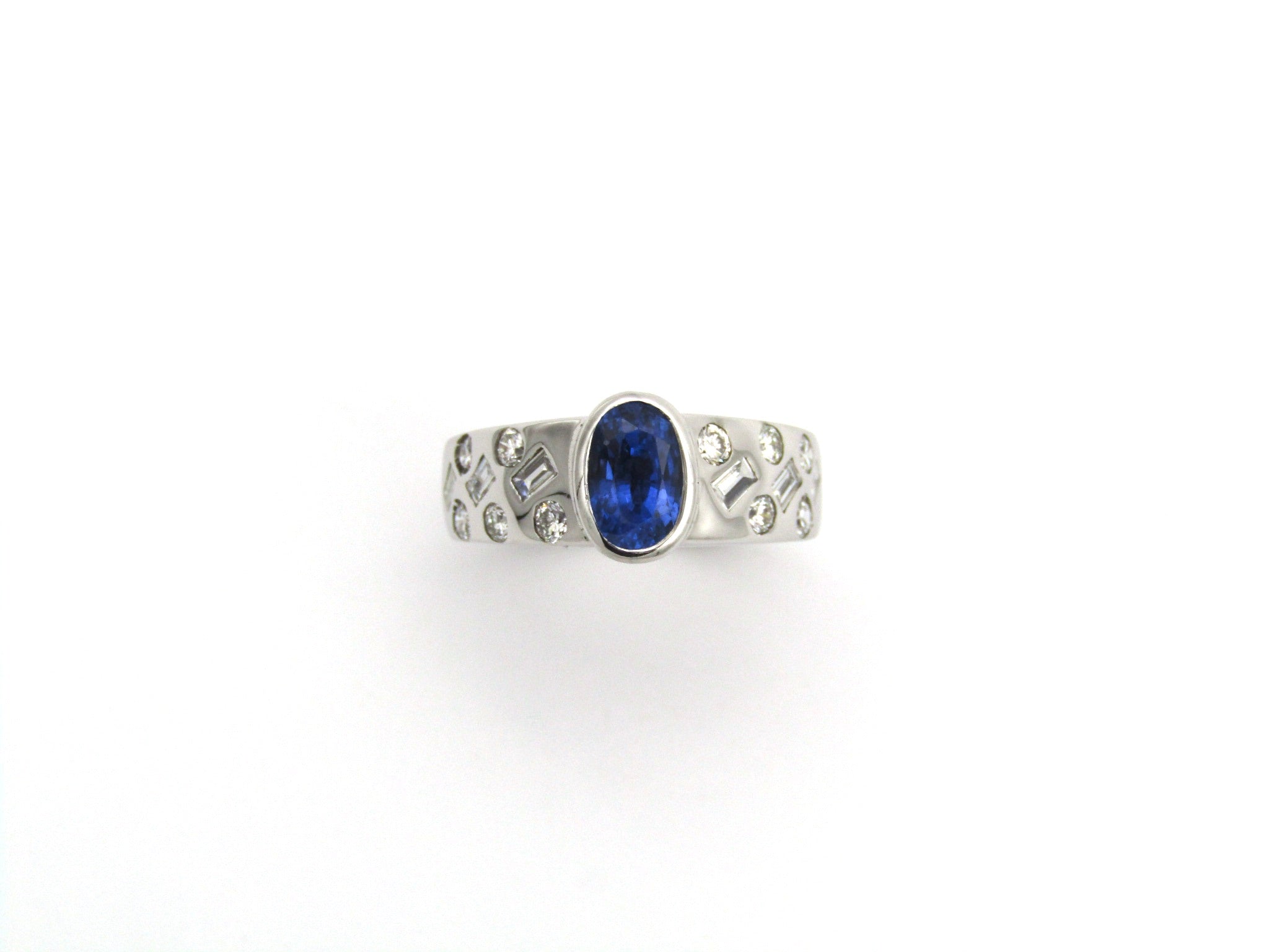 18K gold sapphire and diamond ring.