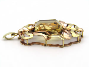 14kt yellow and rose gold citrine pendant.