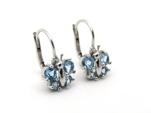 18K gold blue topaz butterfly earrings.