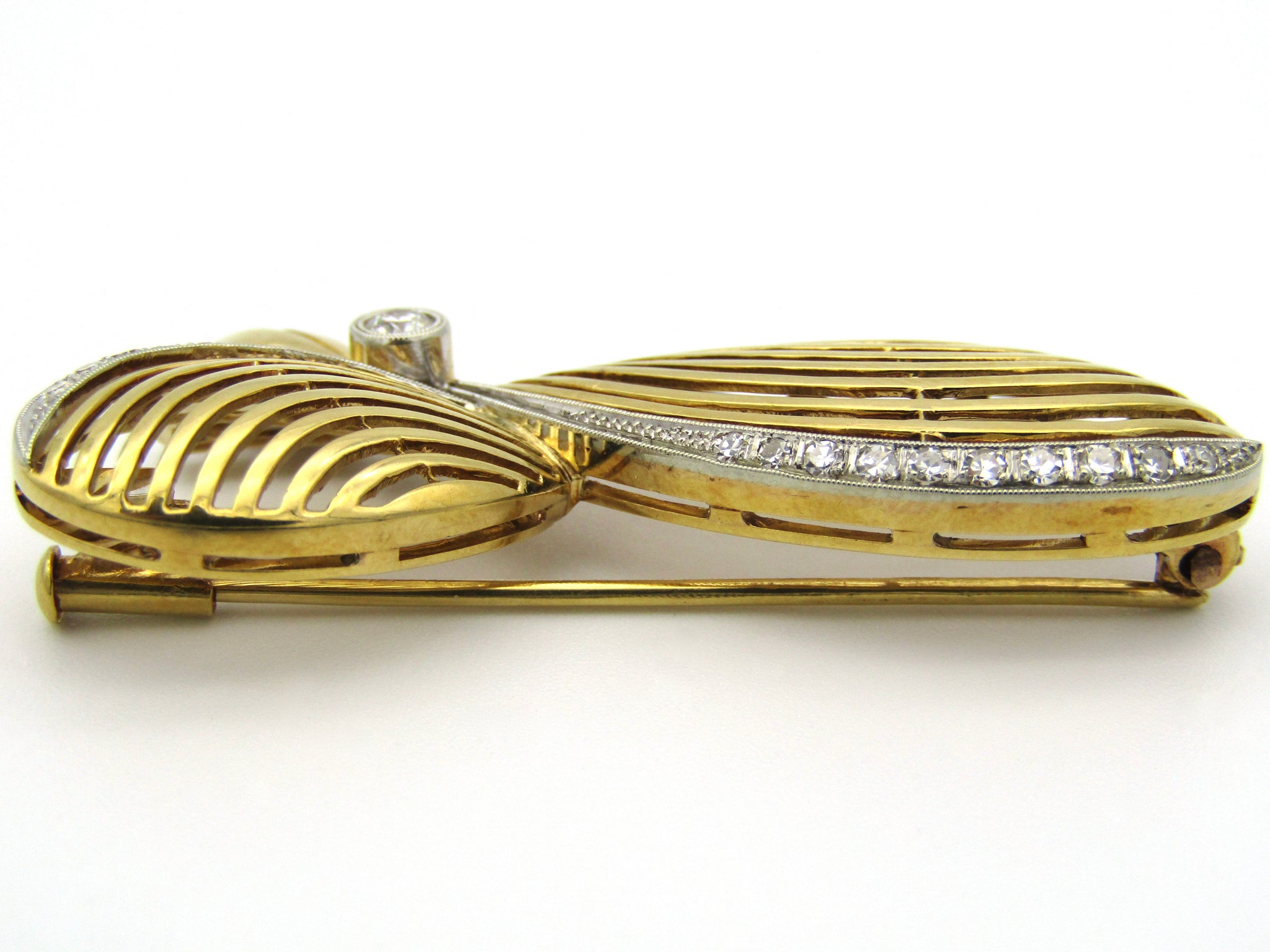 18kt gold diamond brooch, Circa 1940's.