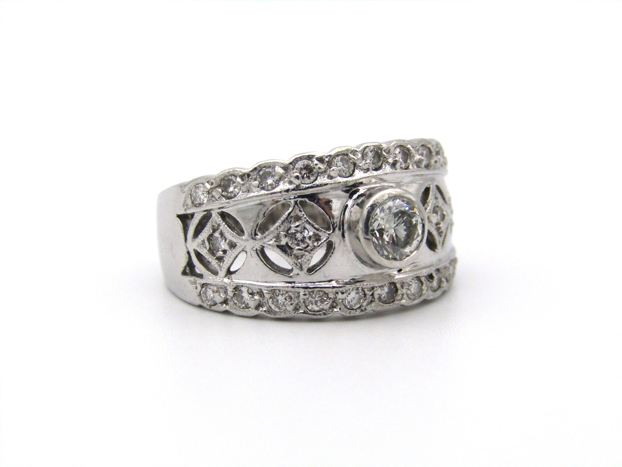 18kt gold diamond ring by Jenna Clifford.