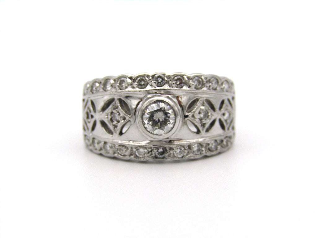 18kt gold diamond ring by Jenna Clifford.
