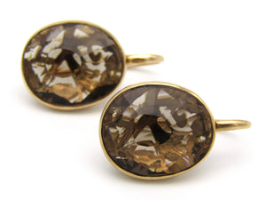 18kt gold smokey quartz earrings by designer Pomellato.