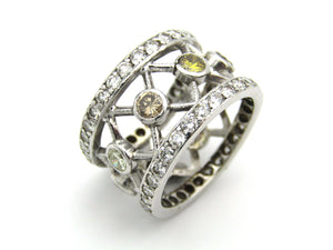9kt gold fancy and colourless diamond ring.