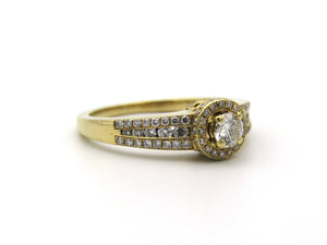 18K gold diamond halo ring.