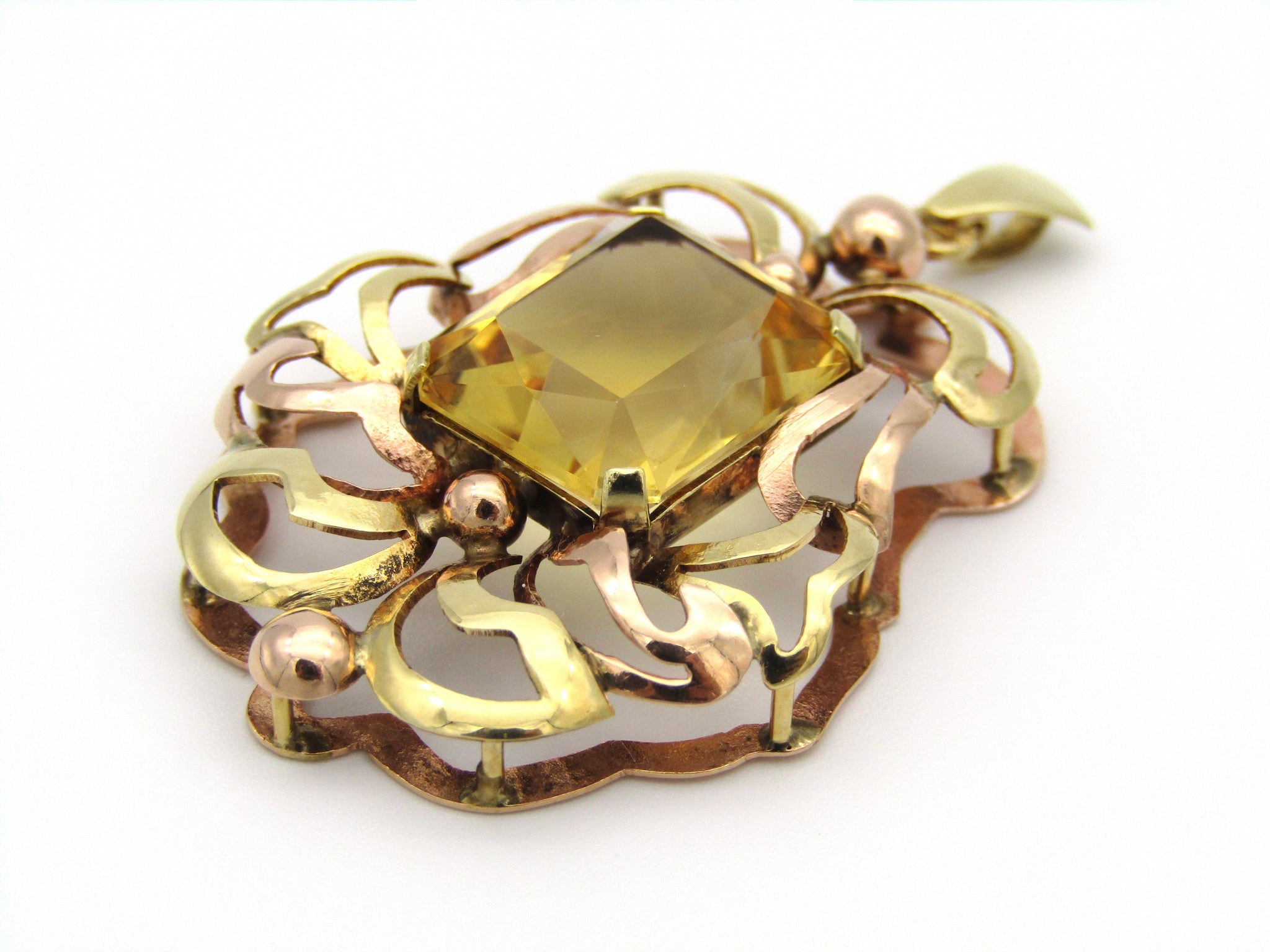 14kt yellow and rose gold citrine pendant.
