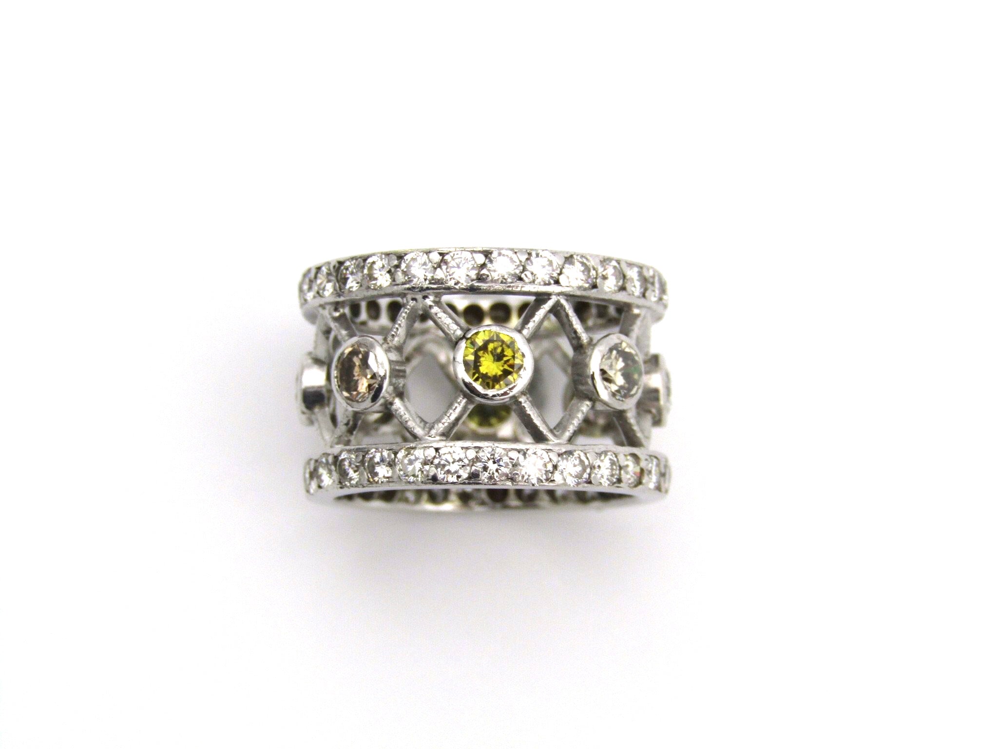9kt gold fancy and colourless diamond ring.
