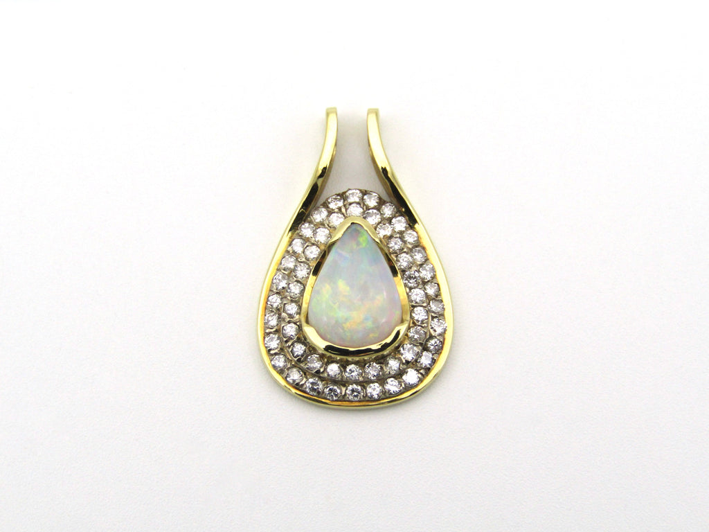 18K gold opal and diamond pendant.