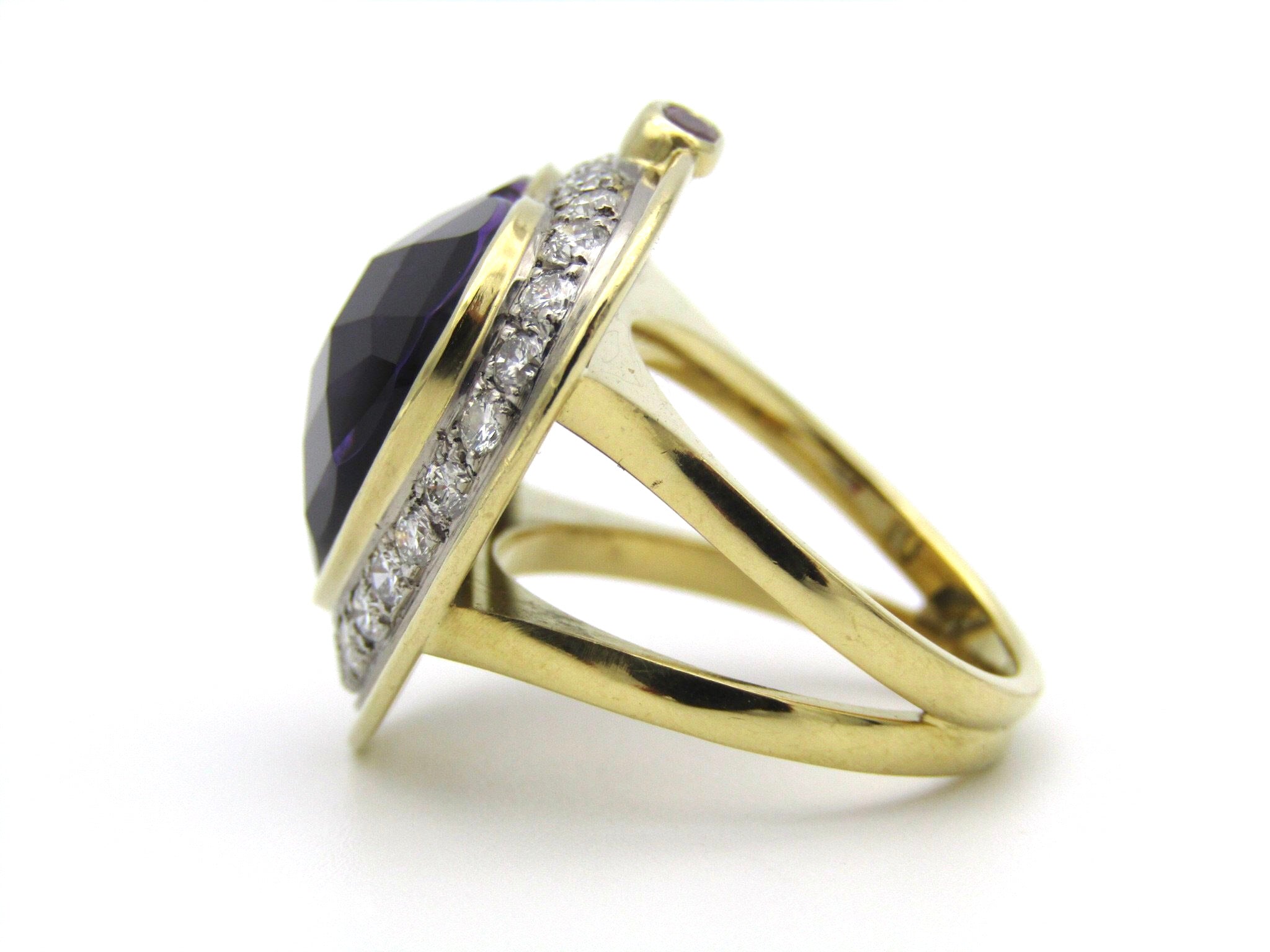18kt gold amethyst, diamond, and ruby ring.