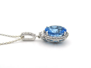 18K gold blue topaz and diamond pendant by Browns.