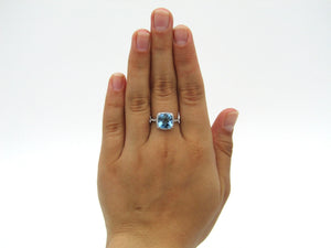 14K gold blue topaz and diamond ring by Browns.